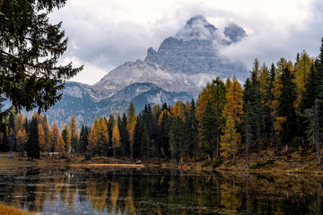 Antorno lake with famous Dolomites mountain peak of Tre Cime di Lavaredo