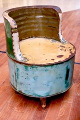 Custom vintage chair made or soldered out of a metal barrel 