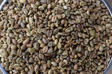 Raw Coffee beans close up backgrounds textures