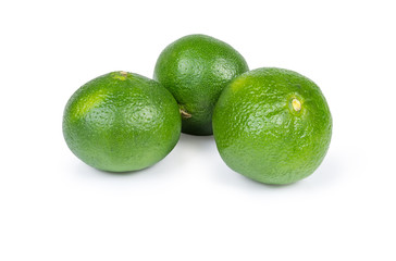 Ripe green tangerines on a white background