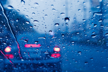 raining when driving a car on the road strom wet moist