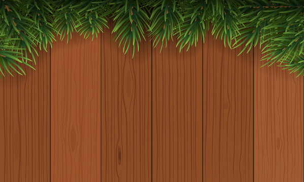 Christmas with fir branch border frame on top of brown wooden background. Vector illustration for greeting card.
