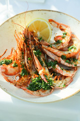 Fried shrimps with garlic and herbs