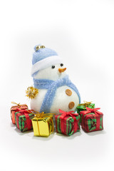 snow man doll with gift boxs isolated white background.