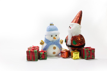 Santa claus and snow man doll with gift box isolated white background closeup.