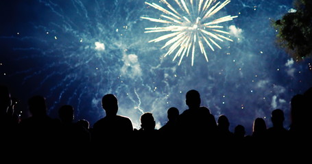 Crowd watching fireworks and celebrating new year eve - Powered by Adobe