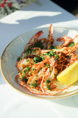 Fried shrimps with garlic and herbs