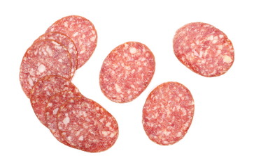 Salami sausage slices isolated on white background, top view