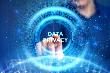 Business, Technology, Internet and network concept. Young businessman working on a virtual screen of the future and sees the inscription: Data privacy
