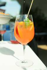 Peach mint cocktail, outdoors