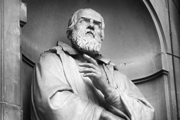 The statue of Galileo Galilei outside the Uffizi colonnade in Florence. Sculpted by Aristodemo Costoli, 1851 - 234237272