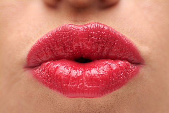 Red lips of a female, close up