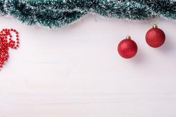 Christmas red balls at white table