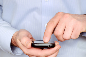 Man using a Smartphone, close up