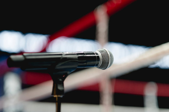 Announcer Microphone On Table Before Boxing Ring