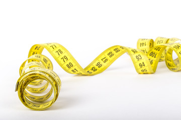 Measuring tape of the tailor for you design. On white background