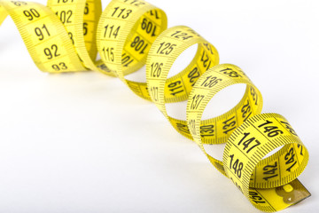 Measuring tape of the tailor for you design. On white background