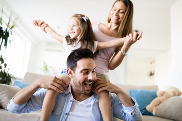 Happy family having fun time at home