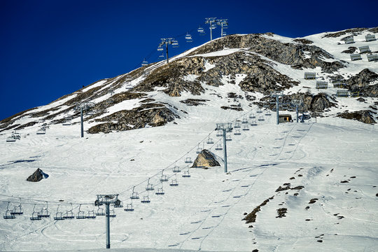 Beautiful. winter landscape on snowy mountains in France, Tignes. Ski resort on sunny day. The view on ski lift.