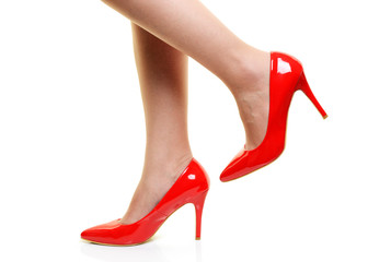 Woman wearing sexy red stiletto high heels, close up, cut out