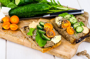 Fresh vegetables and leaves of arugula for sandwiches