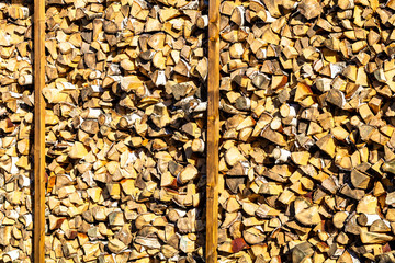Abstract photo of a pile of natural wooden logs background