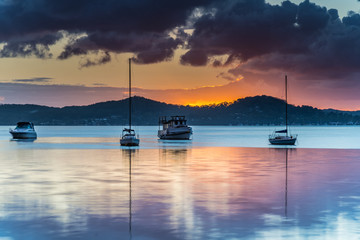 Sunrise and Cloudy Morning on the Bay with Boats