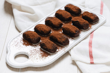 cocoa. chocolate cake with coffee. chocolate and cookies. chocolate cake. white background and towel. 