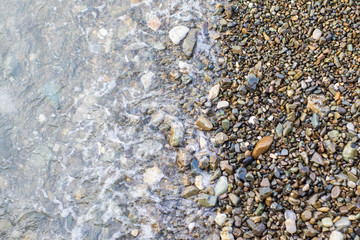 Beach stone background with sea