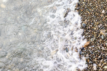 Beach stone background with sea