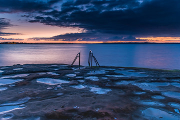 Purple and Orange Dawn Waterscape over the Lake