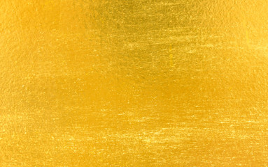 Shiny yellow leaf gold foil texture