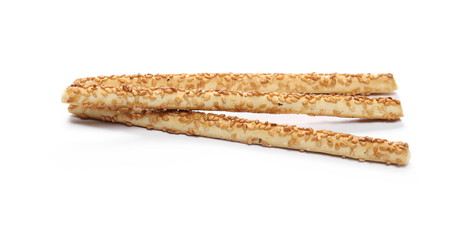 Cracker pretzel bread sticks with sesame isolated on white background