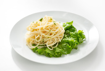 Pasta in a plate on a white background
