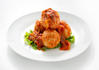 Meatballs in a plate on a white background