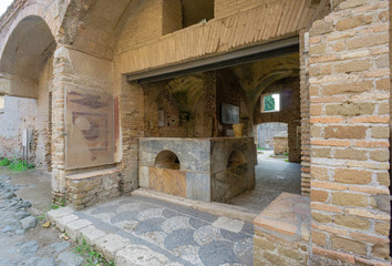 Ostia antica in Rome, Italy. Exterior of the Caseggiato del Termopolio: an ancient bar restaurant of imperial Rome