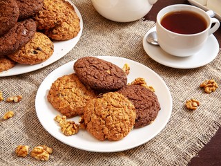 Oatmeal cookies on a plate on a wooden table