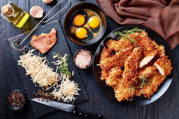 grated potato and cheese crusted turkey chops