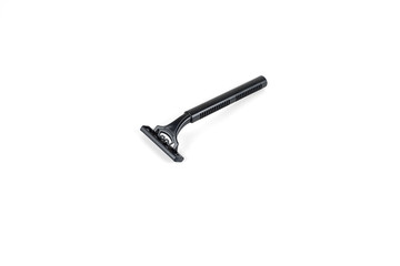 New disposable razor blade, on white background, isolated.