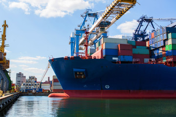 Fototapeta premium container ship close - up. Part of large merchant ship