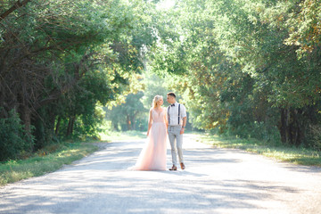 wedding couple on the nature in summer day.