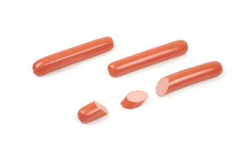 Fresh boiled sausages and slices, isolated on white background