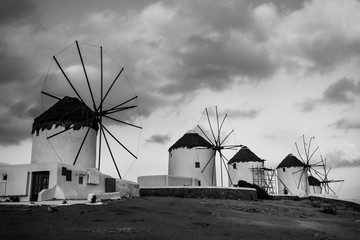 Picturesque view of Mykonos windmills, black and white