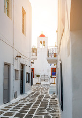 Old Traditional greek street of Mykonos and church, Greece