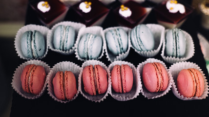 Close up of pink and blue macaroons
