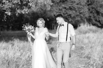 wedding couple on the nature in summer day.