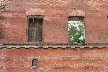 Windows in brick wall
