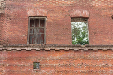 Fototapeta premium Windows in brick wall