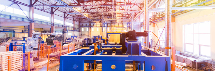 Obraz na płótnie Canvas Fiberglass production industry equipment at manufacture background
