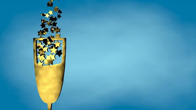 Bicchere dorato con stelle.